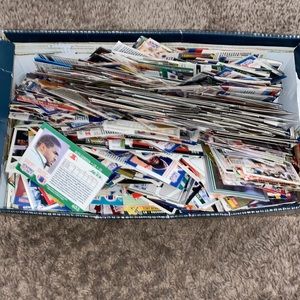 Box of baseball, football and basketball cards